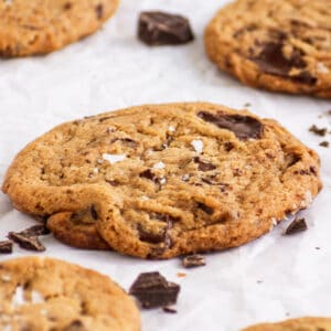 veagn chocolate chip cookie with chocolate pools and flaky sea salt.