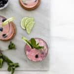 Blueberry Mint Mojito Recipe Overhead Square with limes and mint