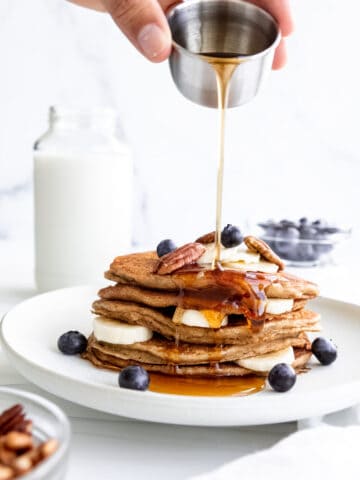 Whole Wheat Pancakes Web Story Cover - Syrup pour
