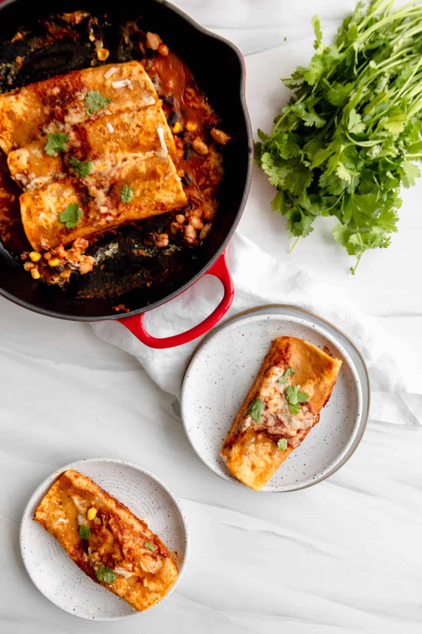 vegan bean enchiladas in a skillet.