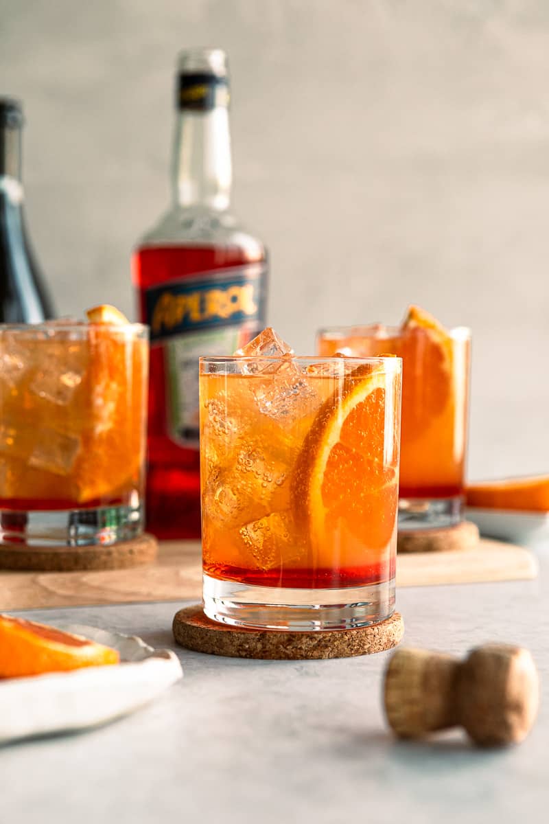 Bubbly aperol spritz with an orange wedge