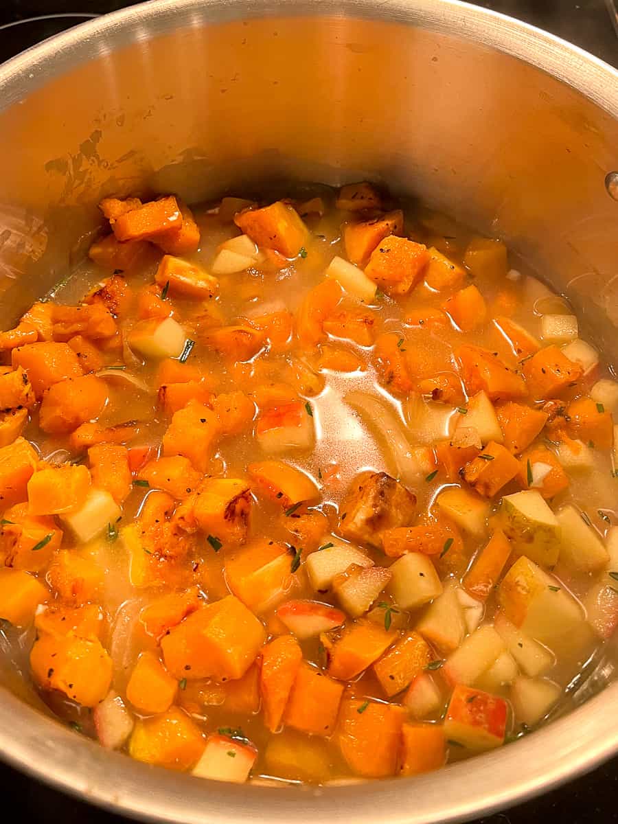 Onions and apples, plus roasted butternut squash, thyme, rosemary, garlic and water (or veggie broth).