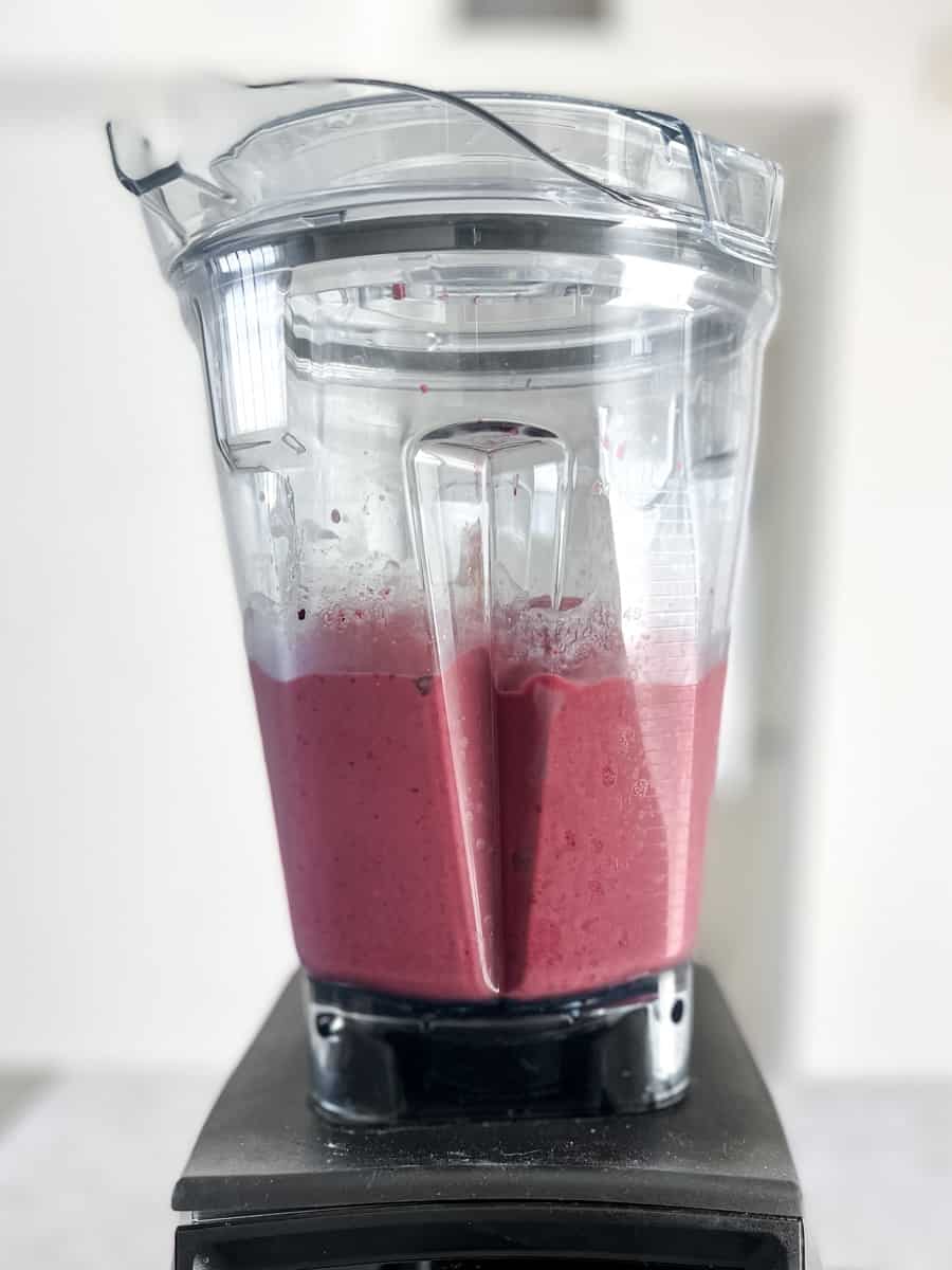 Halfway blended smoothie - most large chunks are gone, but still some smaller chunks and specks to smooth out. 