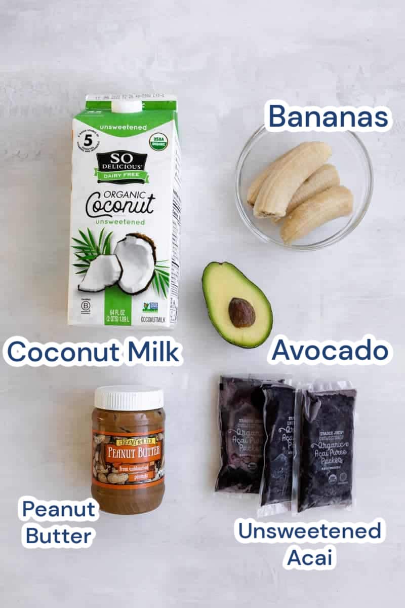 Labelled Ingredients for Acai Smoothie Bowl, coconut milk, bananas, avocado, acai and peanut butter.