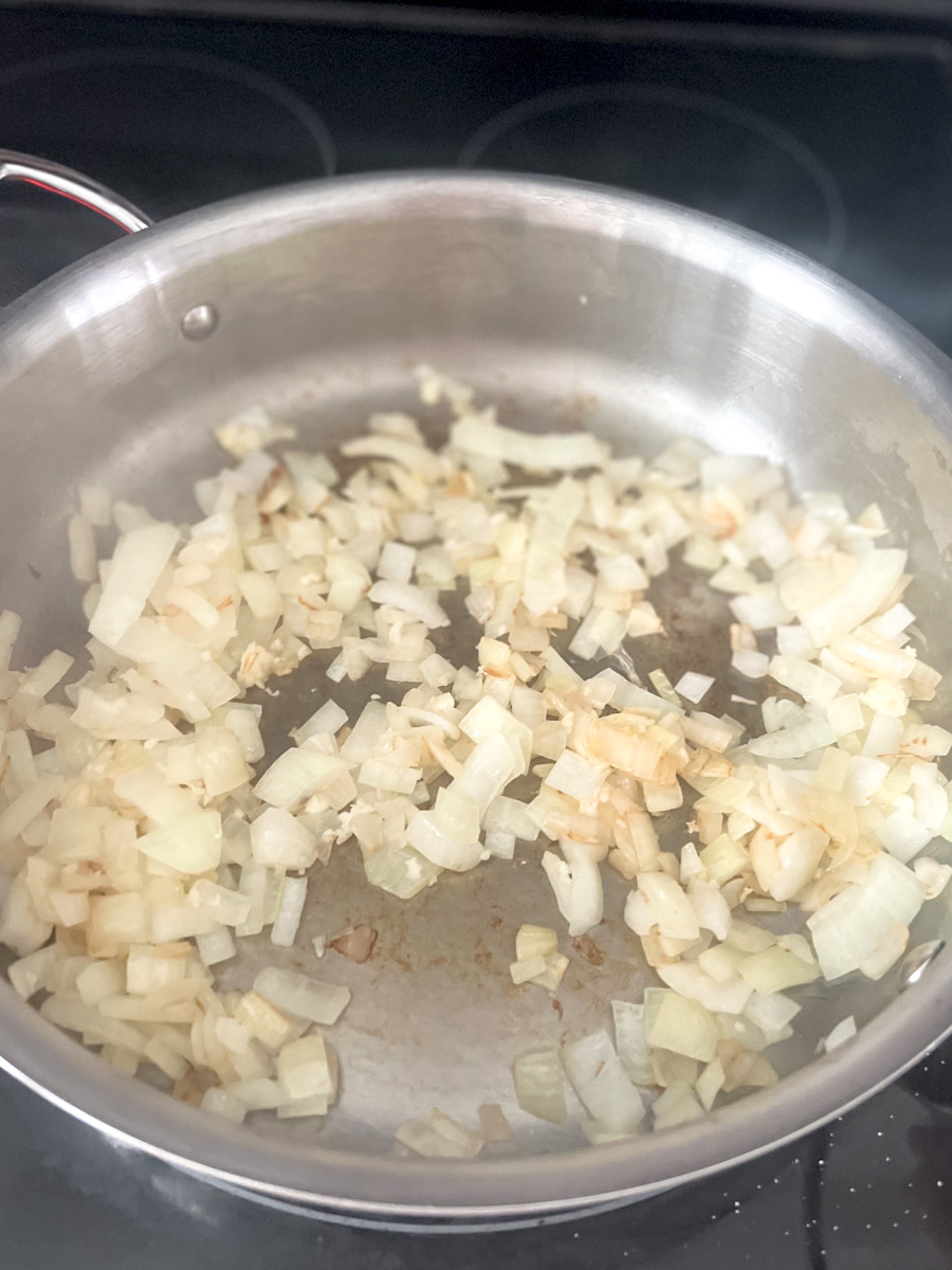 Sauted onions (translucent stage) and garlic in a pan