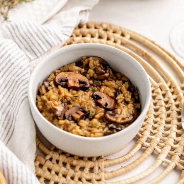 risotto topped with sauteed mushrooms.