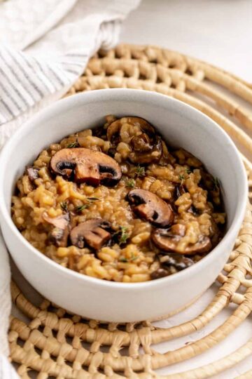 risotto topped with sauteed mushrooms.