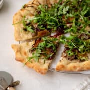 mushroom arugula pizza slice