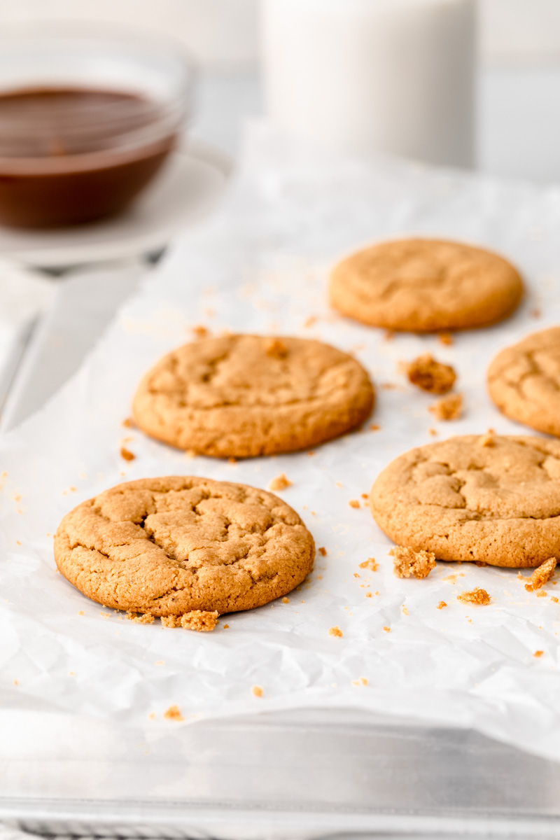 peanut butter cookies on a sheet of parchment paper