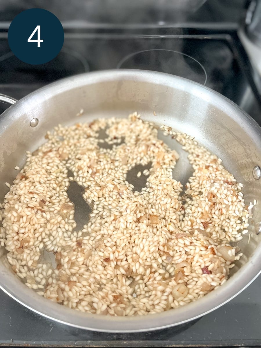 toasted risotto rice in a pan.