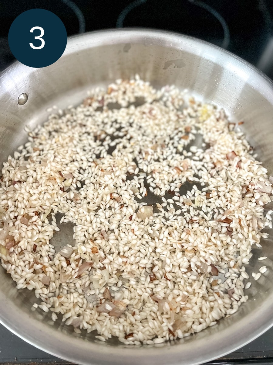 Saute arborio rice and shallots in a skillet.