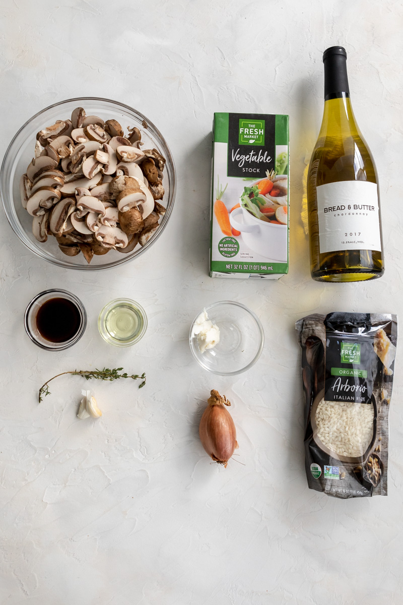 dairy free mushroom risotto ingredients - mushrooms, veggie broth, white wine, soy sauce, grapeseed oil, vegan butter, arborio rice, thyme, garlic and shallot