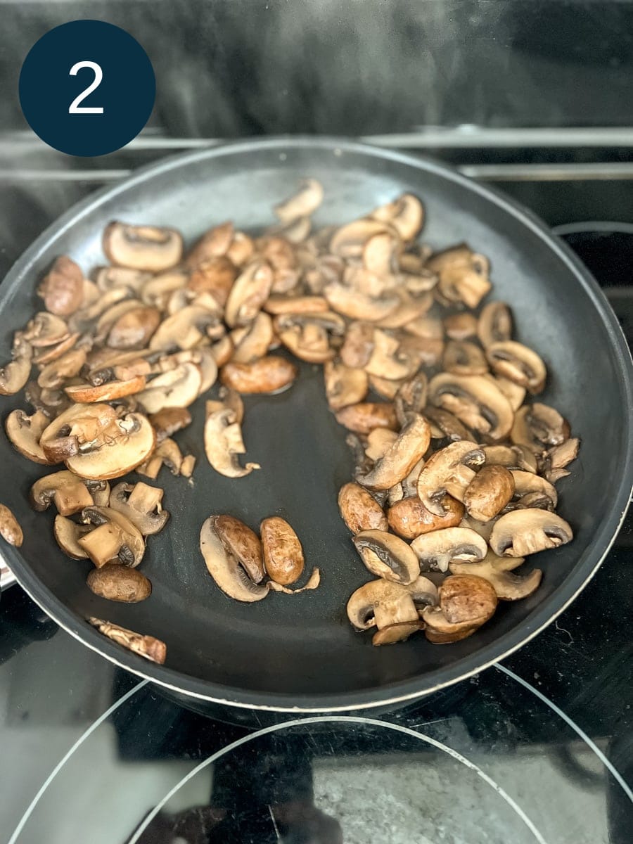 saute mushrooms in a skillet ready to add to risotto.