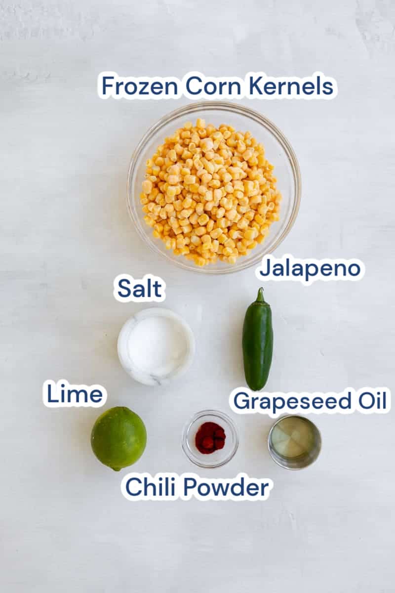 ingredients of easy mexican street corn off the cob (Vegan), frozen corn kernels, jalapeno, salt, lime, grapeseed oil, chili powder.