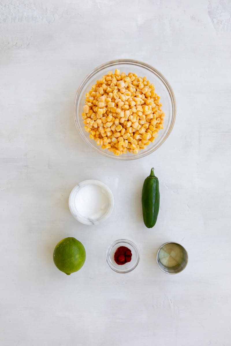 frozen corn kernels, salt, jalapeno, lime, chili powder/cayenne/paprika, oil