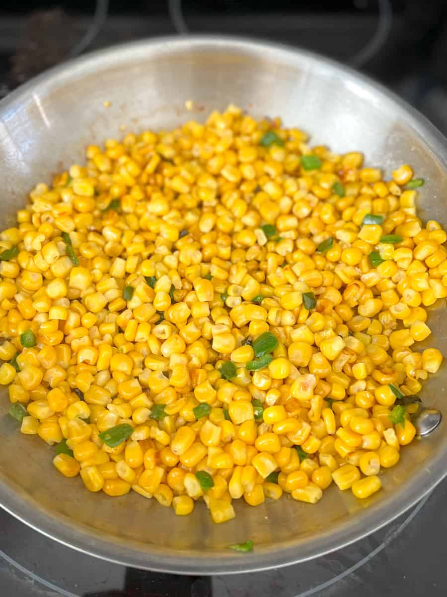 sauteed corn kernels with jalapeno pieces - some browner pieces